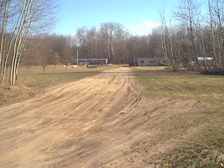 At the road, near the mailboxes!